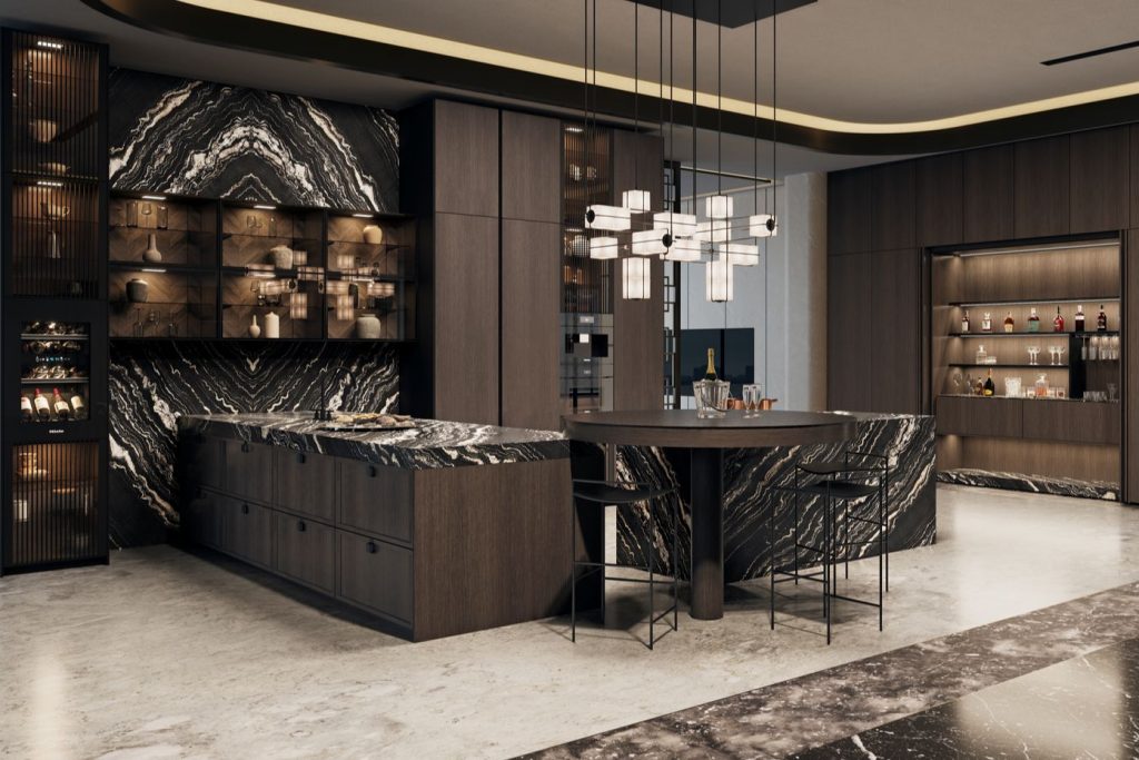 Siematic Mondial luxury large scale kitchen featuring dark wood veneer units, fluted glass units and luxury marble worktops
